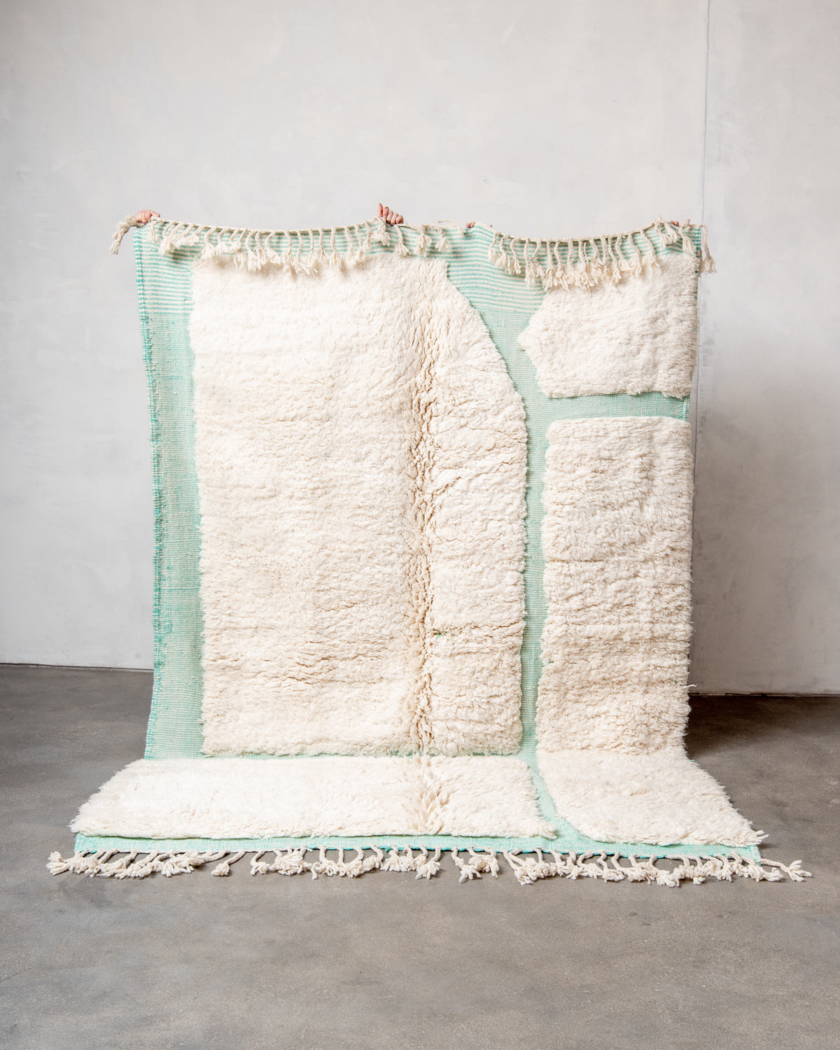 Modern, designer, handcrafted Berber rug from Morocco. Beniourain carpet with beautiful colours and patterns and fluffy wool texture.